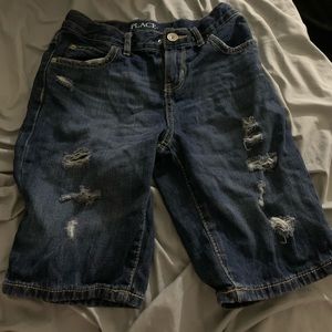 Distressed denim shorts